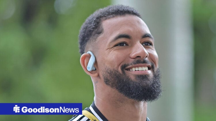 Douglas Luiz smiling