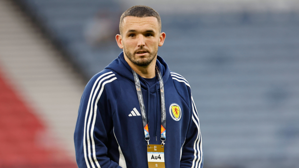 Everton target John McGinn in a Scotland tracksuit.