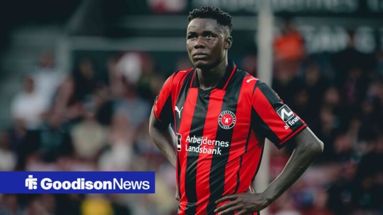 Franculino Dju with hands on hips