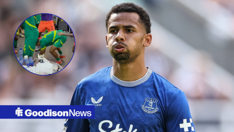 Iliman Ndiaye looking frustrated in Everton top as Iliman Ndiaye falls over for Senegal in circle