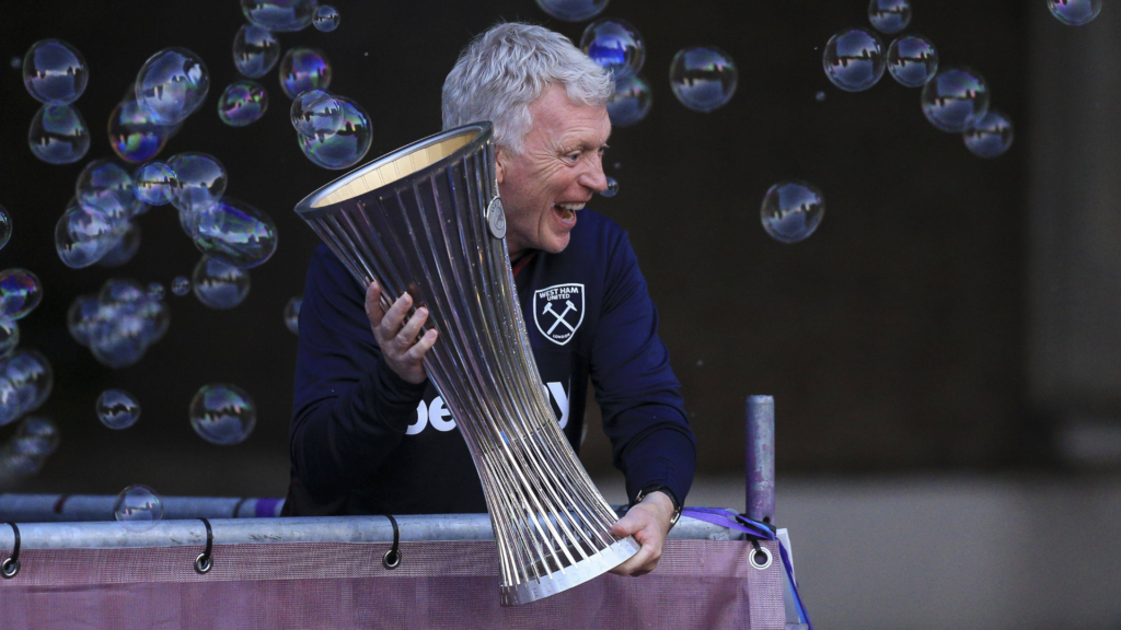 Everton boss David Moyes lifting the Europa Conference League trophy as West Ham boss.