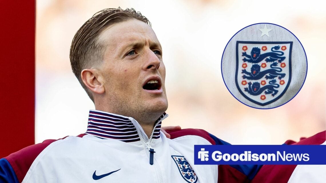 Jordan Pickford singing with England badge in circle