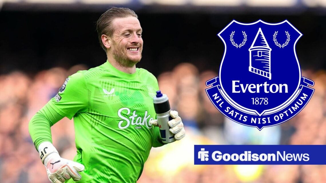 Jordan Pickford in action for Everton, with an Everton badge alongside him