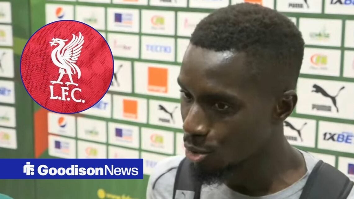 Idrissa Gueye speaking in Senegal looking towards a Liverpool badge in a circle inset