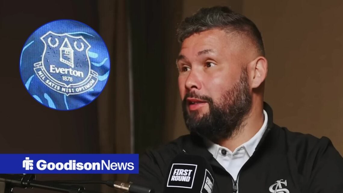 Tony Bellew looking concentrated towards an Everton badge in a circle inset