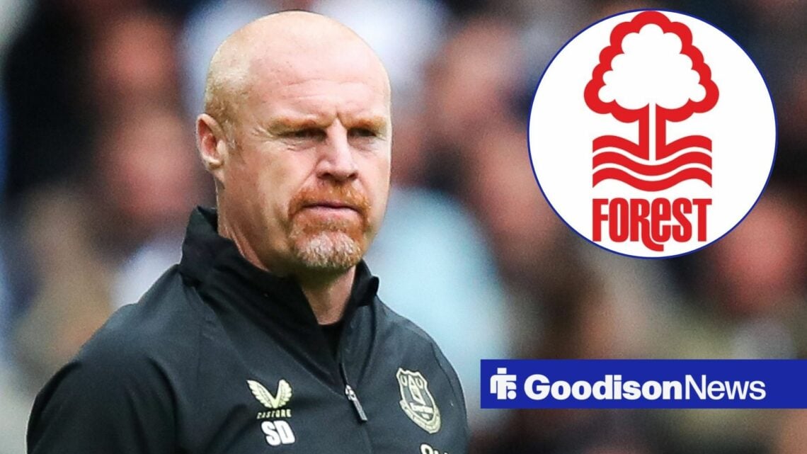 Sean Dyche in Everton gear looking at the Nottingham Forest badge.