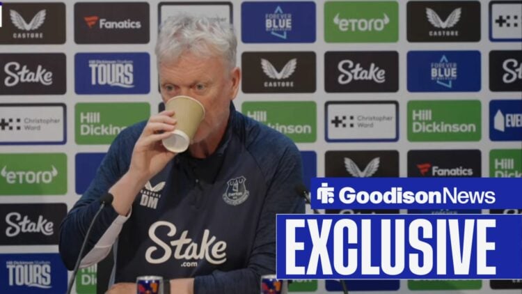 David Moyes drinking out of a cup at a press conference