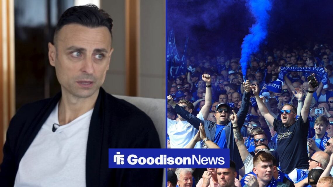 Dimitar Berbatov looking scared in the direction of Everton fans who are holding flares.