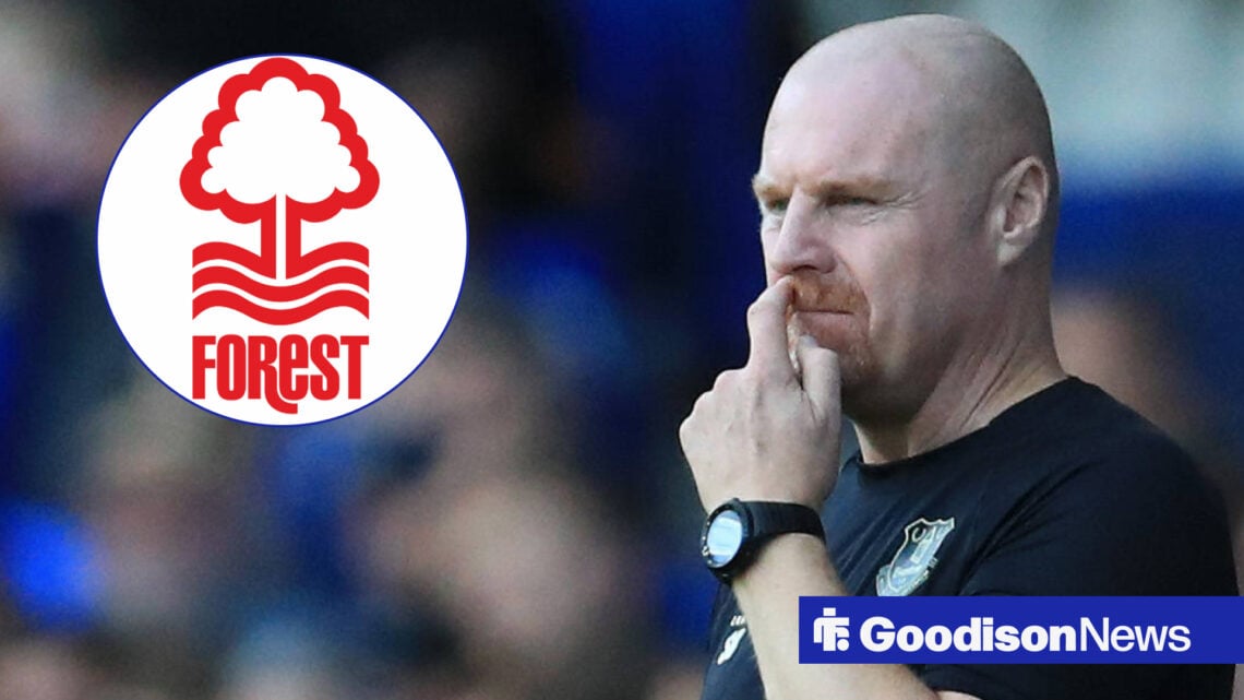 Sean Dyche in Everton gear looking at the Nottingham Forest badge.