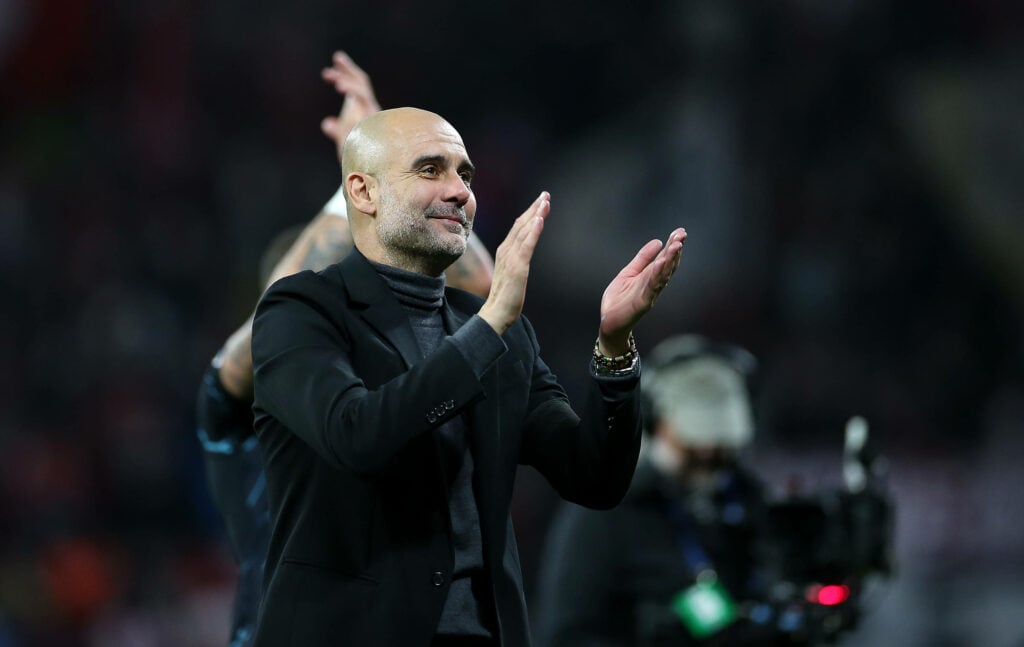 Manchester City manager Pep Guardiola claps