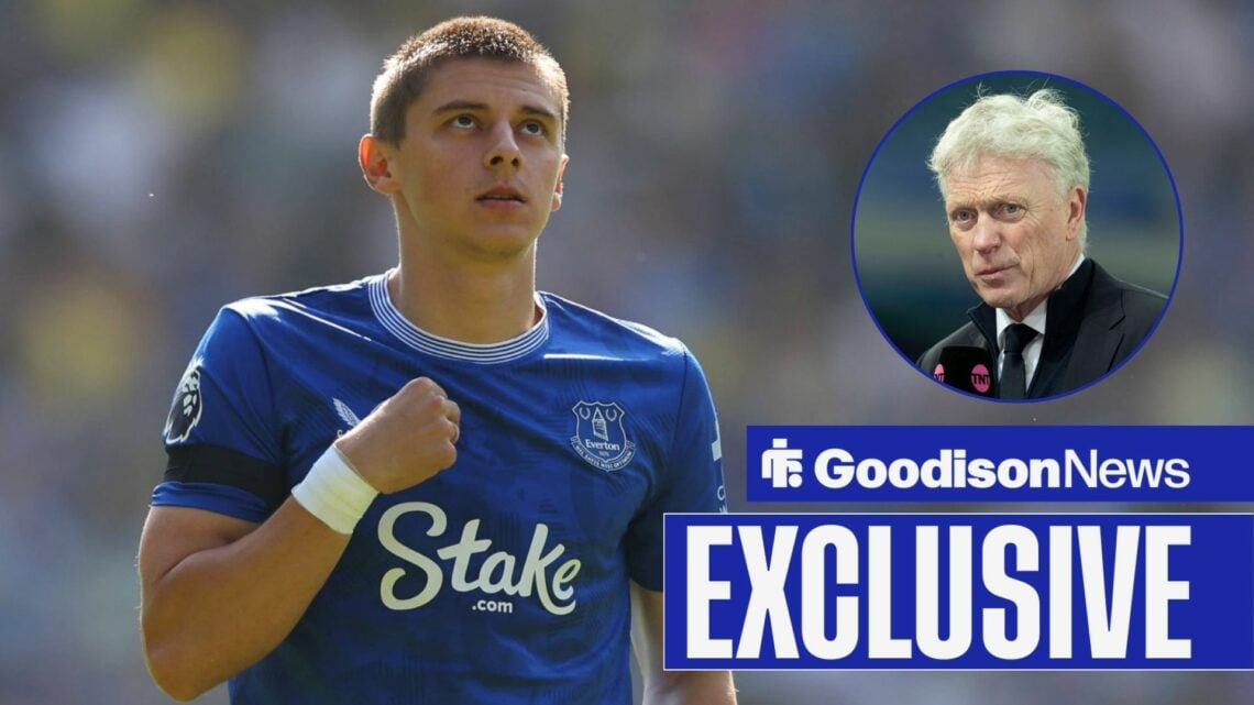 Goodison News exclusive as Everton defender Vitalii Mykolenko stares at the sky during a game, as David Moyes watches on while being interviewed in...