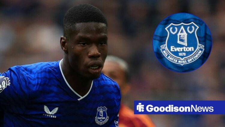 Thierno Barry playing for Everton looking towards an Everton badge in a circle inset
