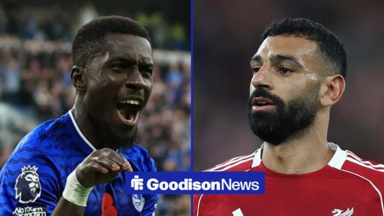 Everton midfielder Idrissa Gana Gueye celebrates with Liverpool forward Mohamed Salah