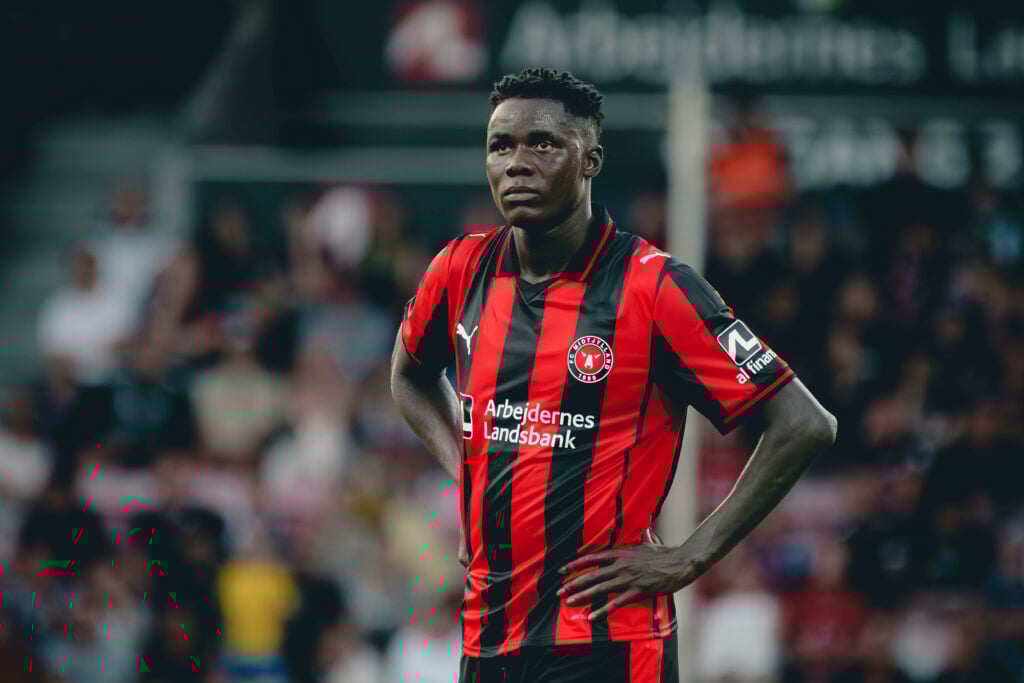 Franculino Dju with hands on hips