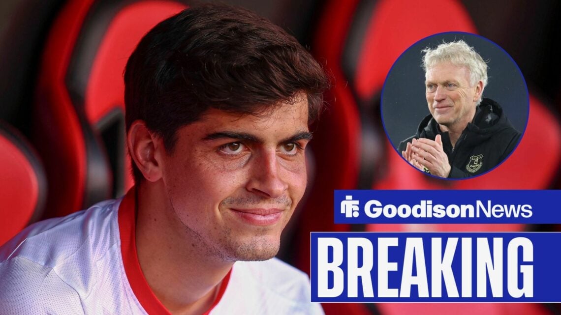 Breaking news as Juanlu Sanchez smiles while sat on the bench for Sevilla, as Everton manager David Moyes applauds in a circular inset.