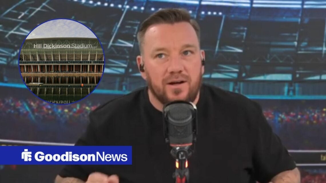 Jamie O'Hara looks towards a circular frame of Hill Dickinson Stadium