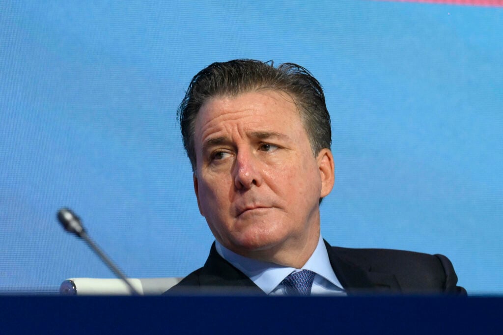 Dan Friedkin speaking at a financial summit