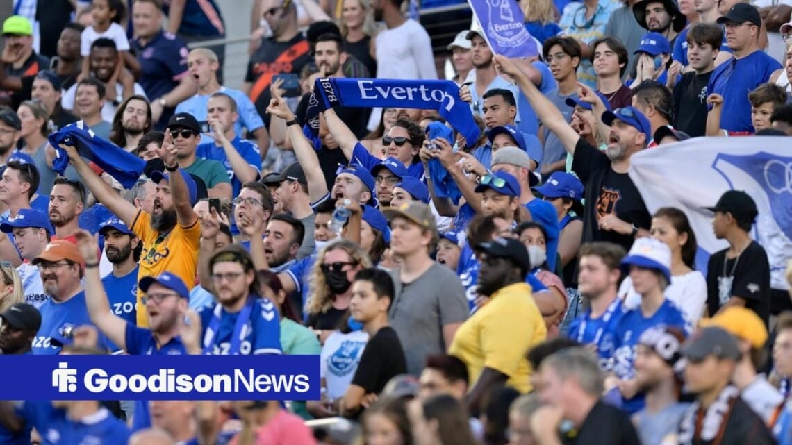 Everton fans cheering on their team.