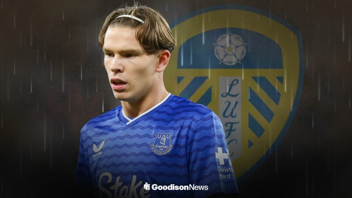 Tyler Dibling wearing an Everton shirt standing infront of a Leeds United badge