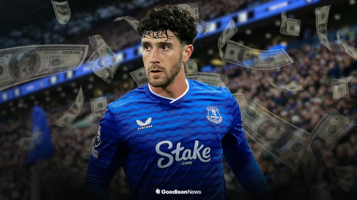 Marcos Senesi in an Everton shirt at the Hill Dickinson Stadium surrounded by bank notes