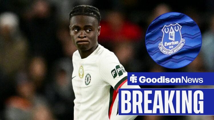 Tyrique George looking towards circular inset of Everton badge