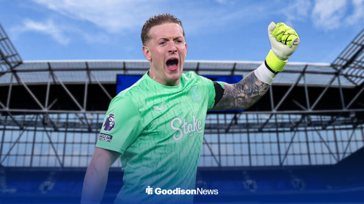 Jordan Pickford with his arm raised at Hill Dickinson Stadium.