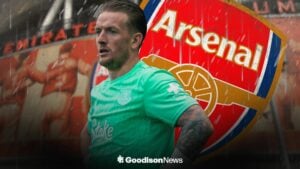 Jordan Pickford looking annoyed at Everton ahead of an Arsenal badge