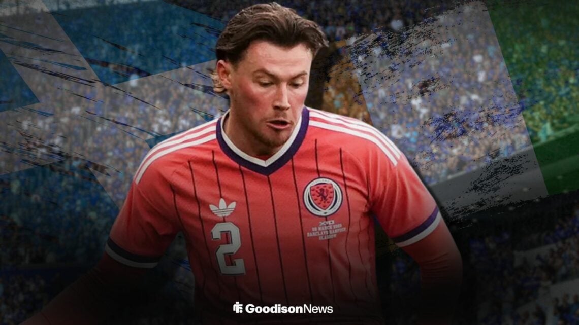 Nathan Patterson playing for Scotland alongside the Ivory Coast flag