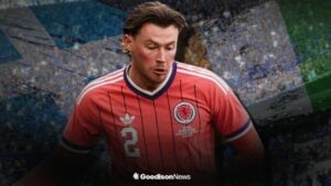 Nathan Patterson playing for Scotland alongside the Ivory Coast flag