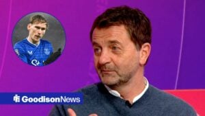 Tim Sherwood looking towards a circular frame inset of James Garner