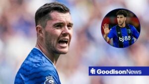 Everton star Michael Keane looking anguished looking towards Marcos Senesi playing for Bournemouth