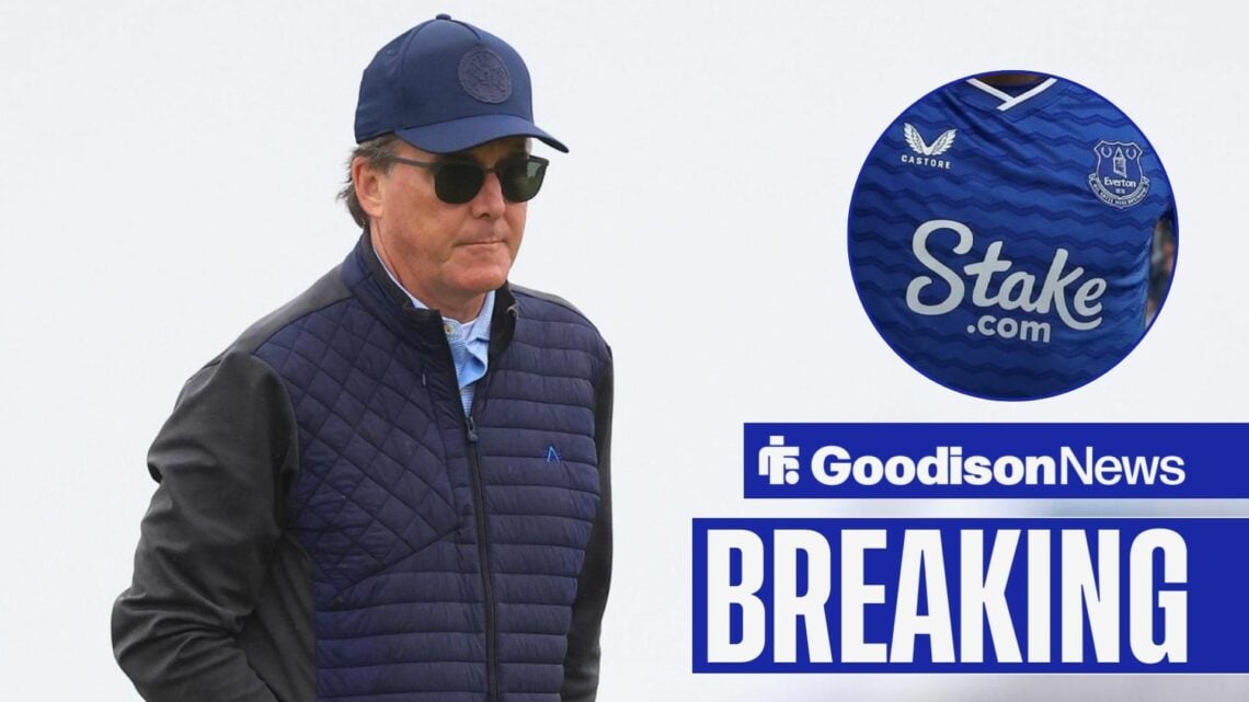 Dan Friedkin looking in the direction of Everton's home shirt from the 2025-26 season, which features Stake's logo.