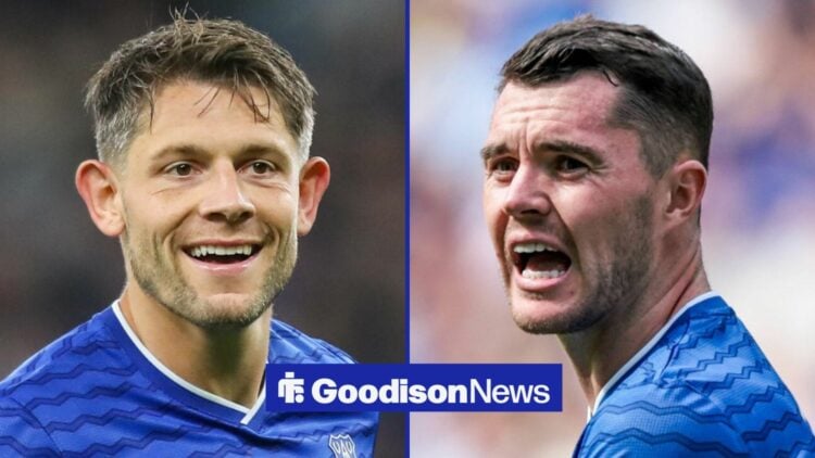 James Tarkowski smiling in the direction of Everton team-mate, Michael Keane.